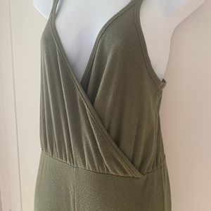 Green ribbed Romper - loose fitting with flared leg.  Women’s Size Medium